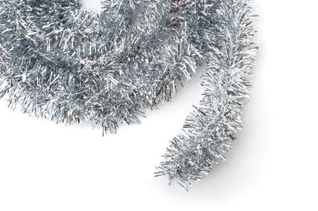 Christmas silver tinsel Isolated on a white background.の写真素材