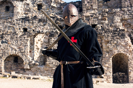 Ancient knight in metal armor