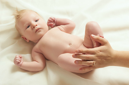 blond babe gets care from motherの写真素材