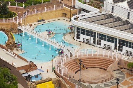 Hong Kong, China - June 1, 2015: Public outdoor swimming pool in Kowloon Park, Hong Kong during daytime.のeditorial素材