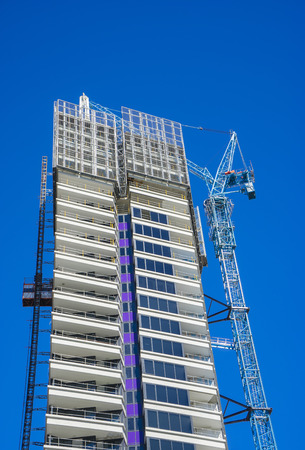 Melbourne, Australia - September 10, 2015: View of tall, modern building under contruction in...