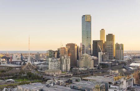 Melbourne, Australia - July 31, 2016: Aerial view of Melbourne cityscape with modern buildings during sunset. Melbourne is one of the most populous city in Australia.のeditorial素材