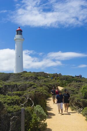 Tourists and Split Point Lighthouse on the Great Ocean Road, Australiaのeditorial素材