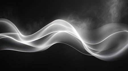 High contrast abstract background of curved monochrome lines flowing in dynamic motionの素材