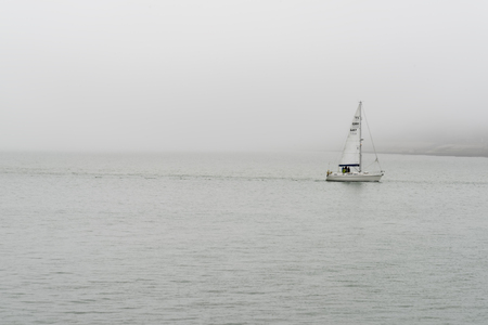 Yacht in morning bay of Portsmouthの写真素材