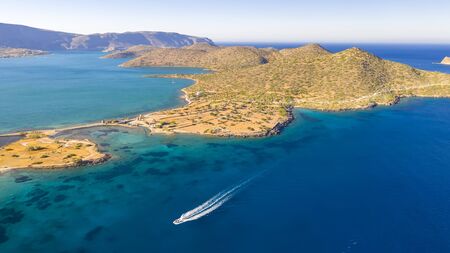 Aerial view of a pleasure boat with tourists. Elounda, Crete, Greece