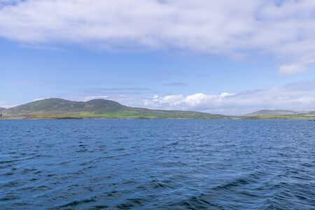 Beautiful aerial view of Beginish Island. Locations worth visiting on the Wild Atlantic Way. Scenic Irish countyside on sunny summer day, County Kerry, Ireland.の写真素材