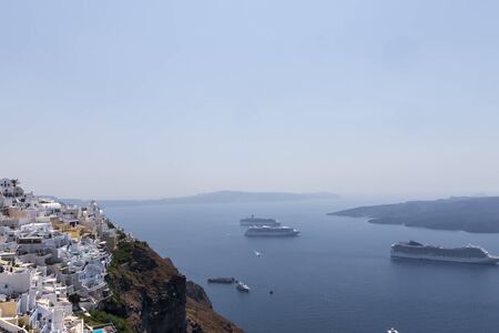 Sea and Volcano view from Fira the capital of Santorini island in Greeceの写真素材