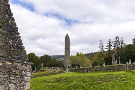 Monastic cemetery of Glendalough, Ireland. Famous ancient monastery in the wicklow mountains with a beautiful graveyard from the 11th centuryの写真素材