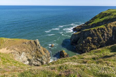 A view of rocks and cliffs near the Baily Lighthouse, Howth North Dublinの写真素材