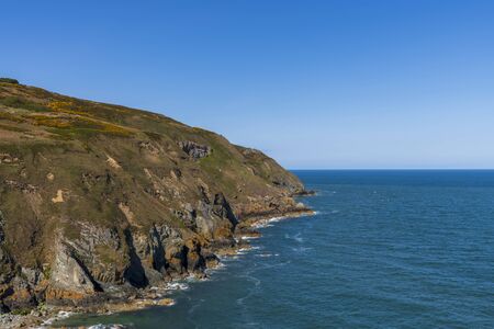 A view of rocks and cliffs near the Baily Lighthouse, Howth North Dublinの写真素材