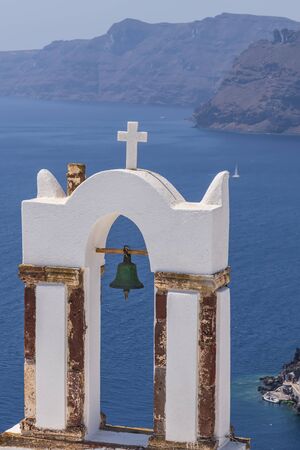 Santorini Church Bells at Oia village look out to Aegean sea, Santorini, Greeceの写真素材