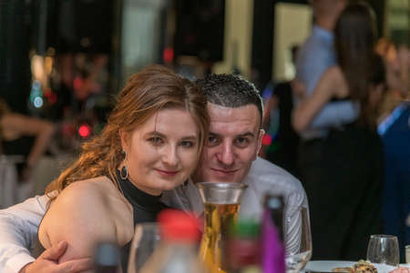 Beautiful couple in a restaurant, London, UKの写真素材
