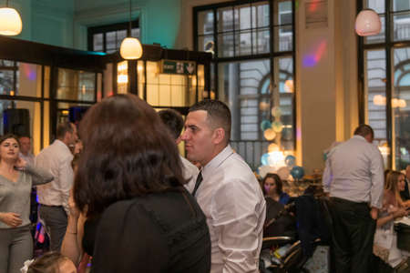 Beautiful couple in a restaurant, London, UKの写真素材