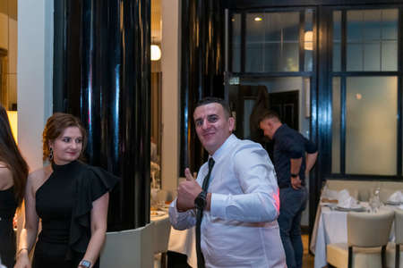 Beautiful couple in a restaurant, London, UKの写真素材