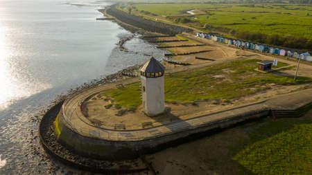 Brightlingsea lighthouse tower at sunset with stunning light special seaside day, Essex, England, UKの写真素材