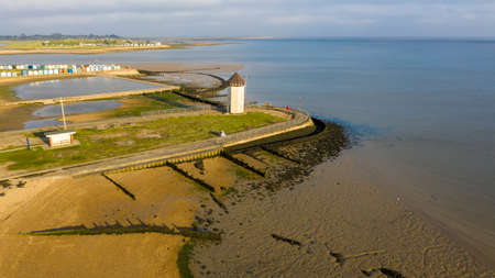 Brightlingsea lighthouse tower at sunset with stunning light special seaside day, Essex, England, UKの写真素材