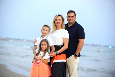 Portrait of a family at the beachの写真素材
