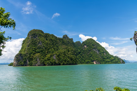 A Serene Island Landscape Surrounded by Crystal Clear Turquoise Waters and Fresh Breeze, Thailand, James Bond Islandの写真素材