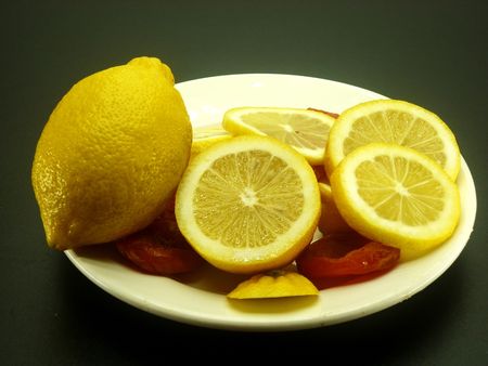 Juicy fragrant lemons, apricot, banana for fruit saladの写真素材