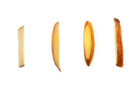 Isolate sliced almond seed, bar shape sliced almond seeds, a close up photo image of four pieces of sliced almond seeds in bar shape isolate on bright white light backgroundの写真素材