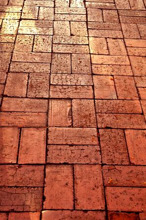 Brick pavement, a select focus on an old pavementの写真素材