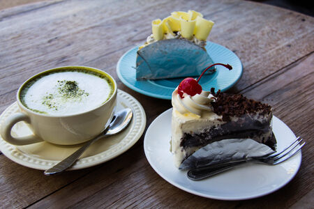 cake and hot green teaの写真素材