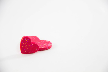 Two red heart on white backgroundの写真素材