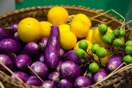 Purple heirloom           & yellow tomatoesの写真素材