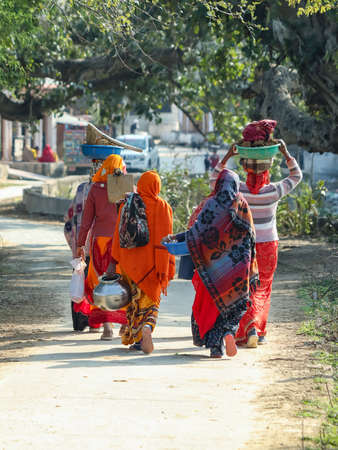 Jaipur, Rajasthan, India- January 25, 2022: Mnrega Womens going to home after work.のeditorial素材