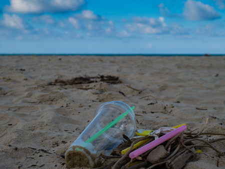 Garbage on the beach trash ,plastic ,bottle ,foam ,rubbish has pollute.selective focusの写真素材
