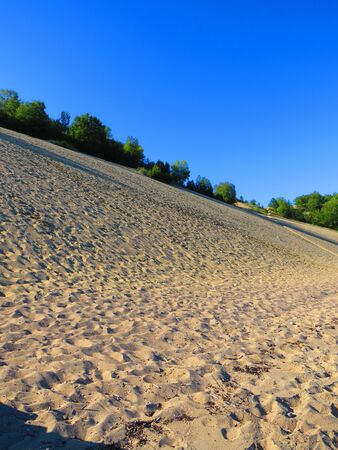 Landscape of shore and dunes in the Penouille sector of Forillon National Park, Gaspe Peninsula, Quebec, Canadaの写真素材