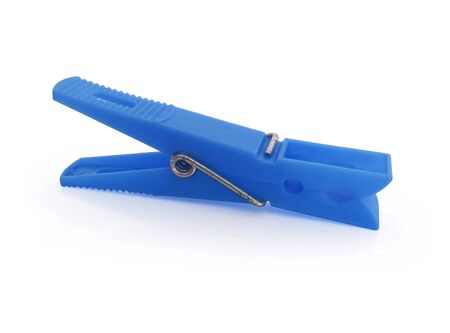 Horizontal view. Isolated blue plastic clothespin on white backgroundの写真素材