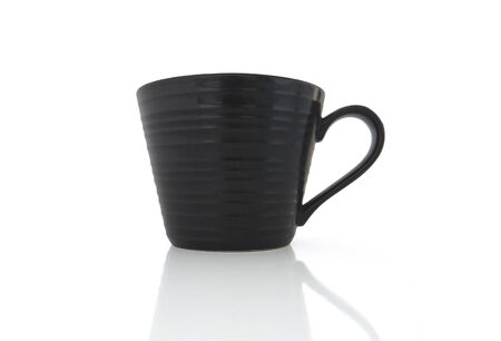 Isolated black porcelain cup on white backgroundの写真素材