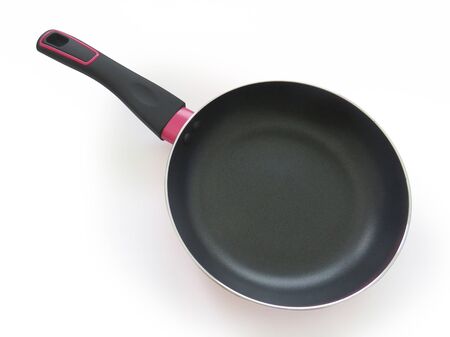 Aerial view of individual black and pink nonstick frying pan isolated on white background.の写真素材