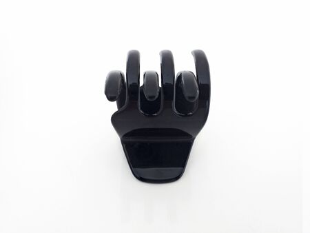 Close up. Black hair clip isolated on white background. High quality plastic hair bandの写真素材