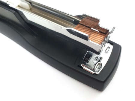 Anti-lock automatic front opening of black office stapler with metal staples.