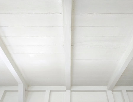 Reed white wooden roof perspective background. White ceiling beams pattern background.の写真素材