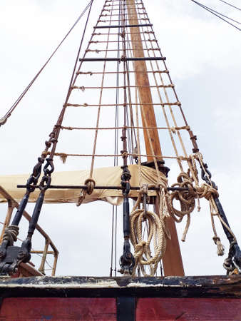 View from below of wooden mast and rigging of Old abandoned wodden traditional fishing boat....
