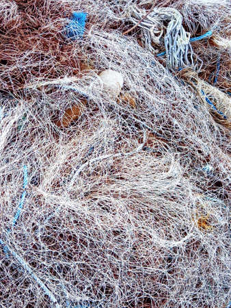 Tangled texture of fishing nets. Traditional fishing tackle from the French West Indies. Caribbean...