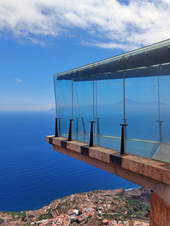 Viewing walkway suspended over the sea with a view of the Teide Volcano. Abrante viewpoint on the island of La Gomera. Architecture and Constructions.の写真素材