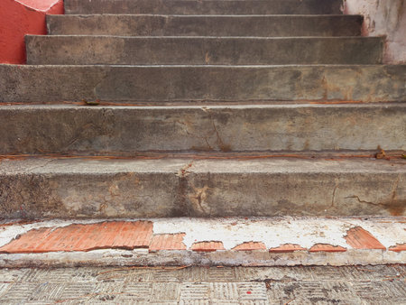 Close up of Cement stairs in rock. Ancient stone steps in the rock. Old damaged stone staircase, up...