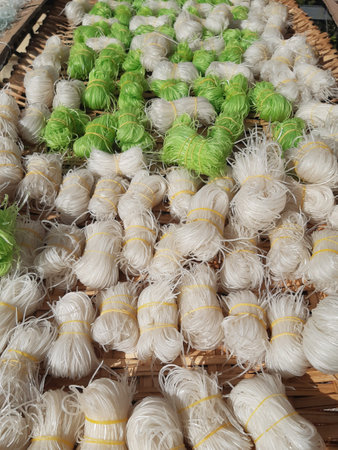 Bun Gao, Vietnamese round rice noodles. Raw, dry, uncooked noodles. Asian cuisine.の写真素材