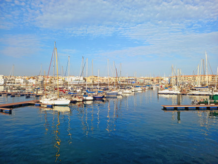 Marina with moored sailing boats. Harbor and boat landscape. Sailing and coastal landscape.の写真素材