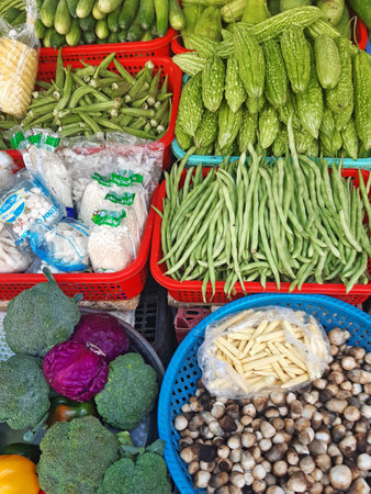 Variety of vegetables ready to sell at the market. Fresh vegetable market, a variety of agricultural products produced by farmers in Asia.の写真素材