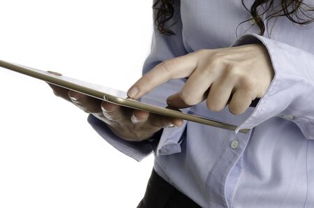 Entrepreneur touching screen of a tablet, white background.の写真素材