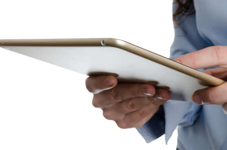 Woman using a thin tablet.の写真素材