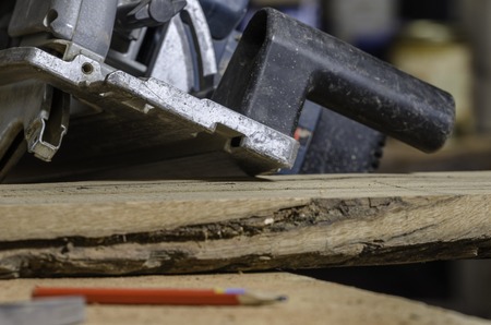 A pencil with saw machine.