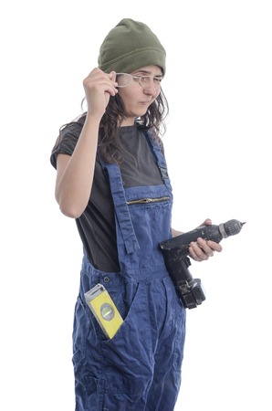 Worker woman make a fool of yourself over white background.の写真素材