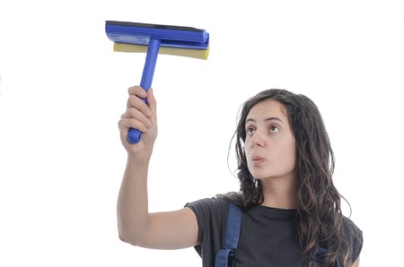 Worker woman cleaning of glasses over white background.
